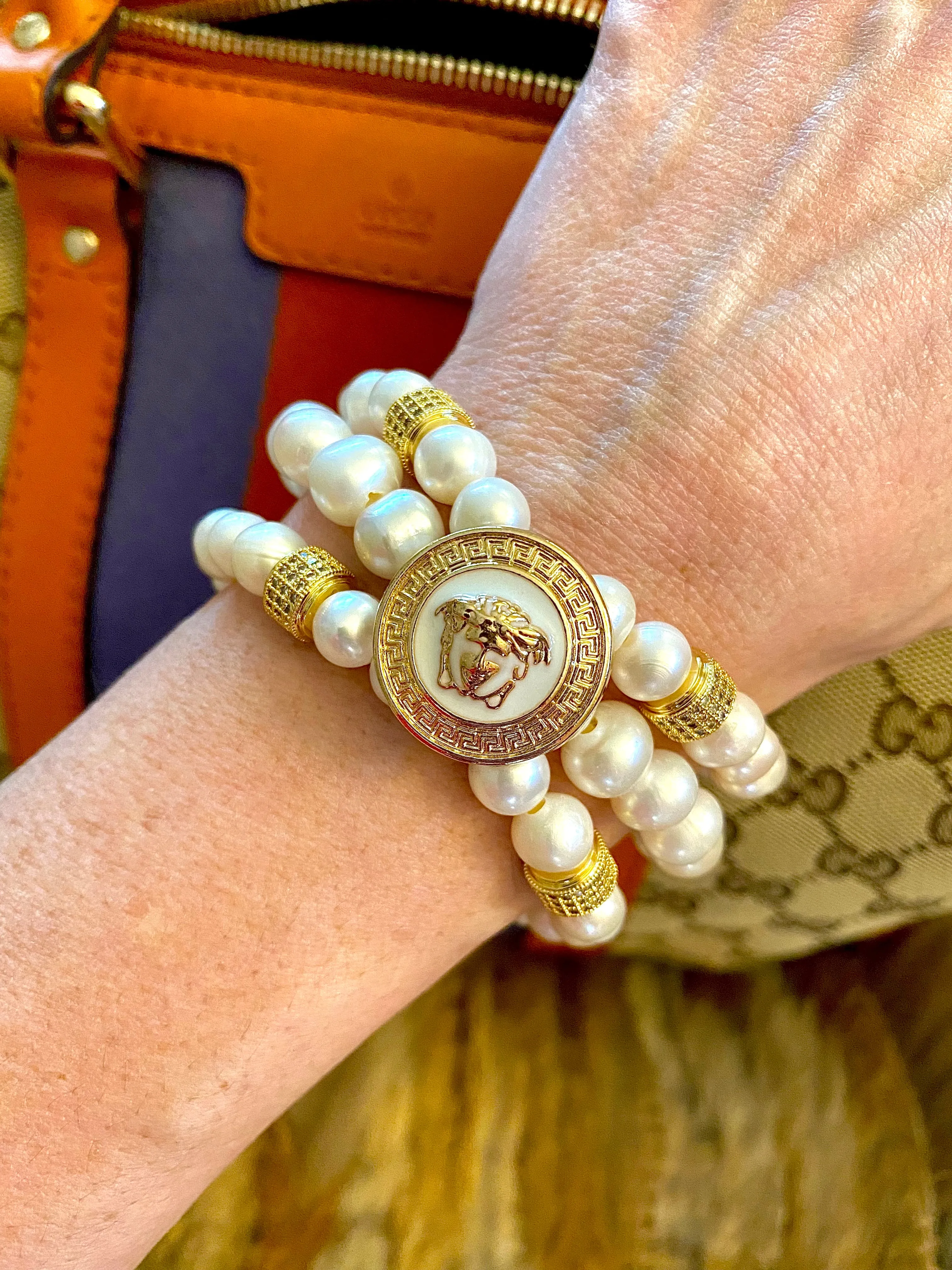 Face of V White and Gold Button bracelet